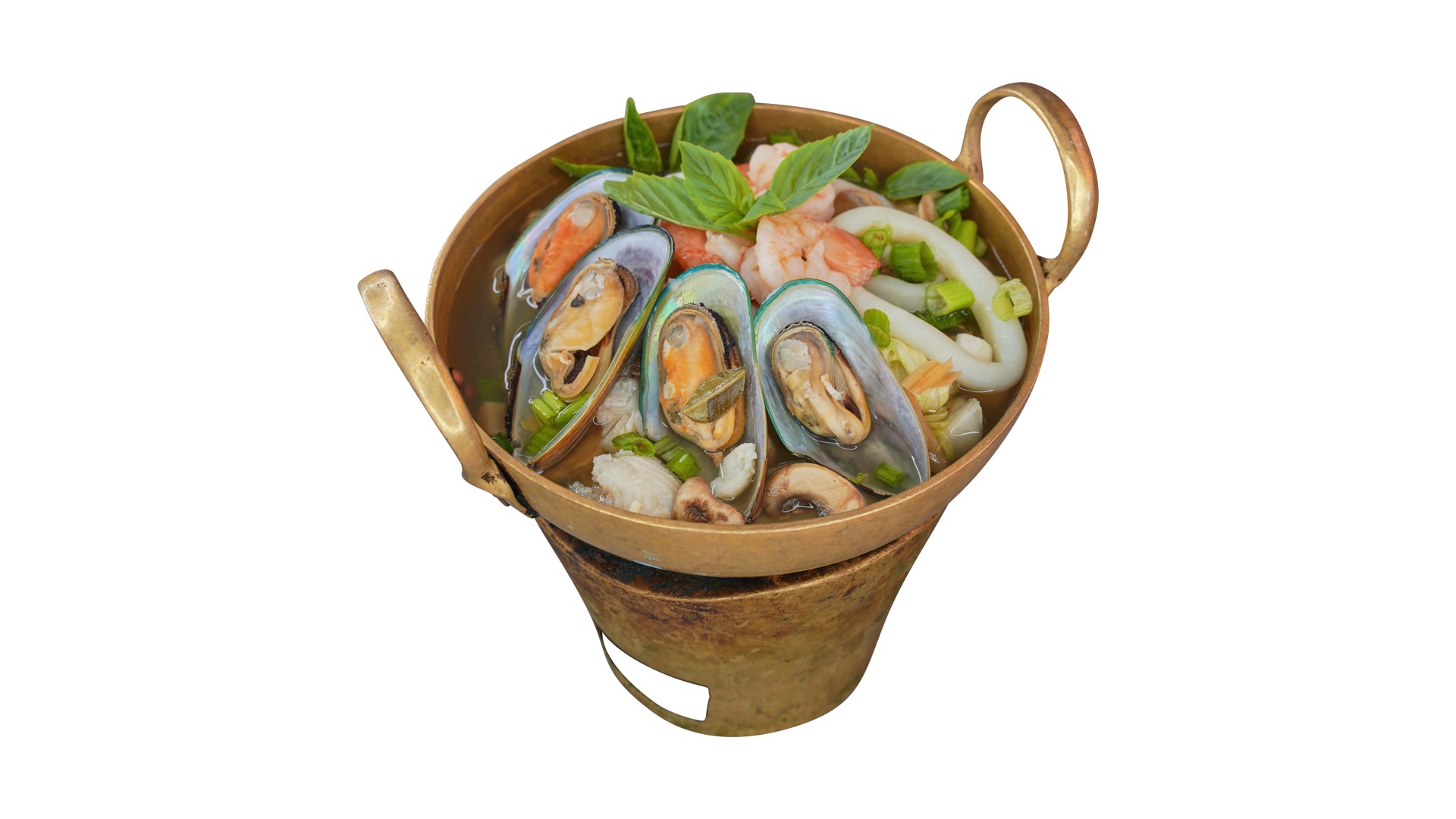 Mussels in a brass pot with Thai basil.